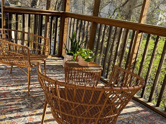 Listen to the babbling creek from your screened in deck!