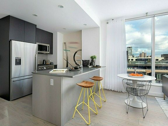 5th image of 420 Kent Ave APT 557