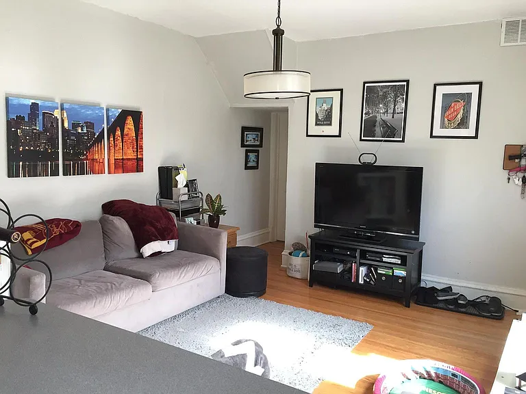 Step into a stylish living area at LS Capital Group, where comfort meets modernity. The spacious layout and contemporary decor create a perfect backdrop for relaxation. Explore your new home today and elevate your lifestyle!