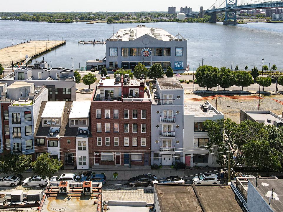 The apartment is in the red building in the center.