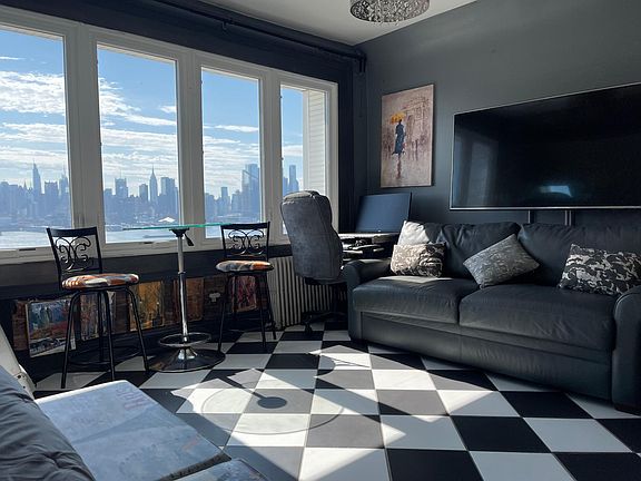 the apartment comes with a queen size bed, a queen size sofa bed and a queen size murphy bed.