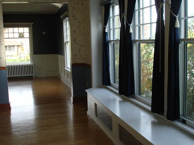 Dining Room Window Seat and Drapes
Window Seat Hides Radiant Heat Below
Living Room in Distance to the left