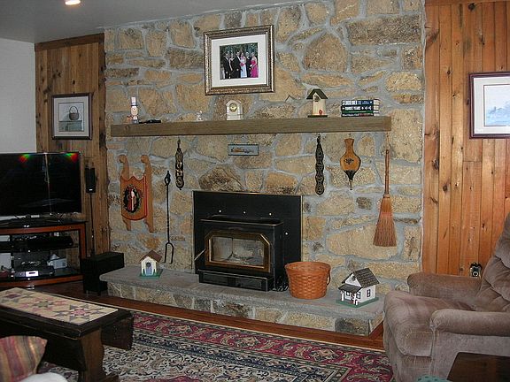 Stone fireplace with insert