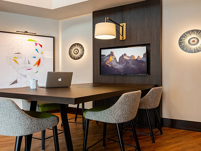 Conference table with TV enabled for virtual meetings