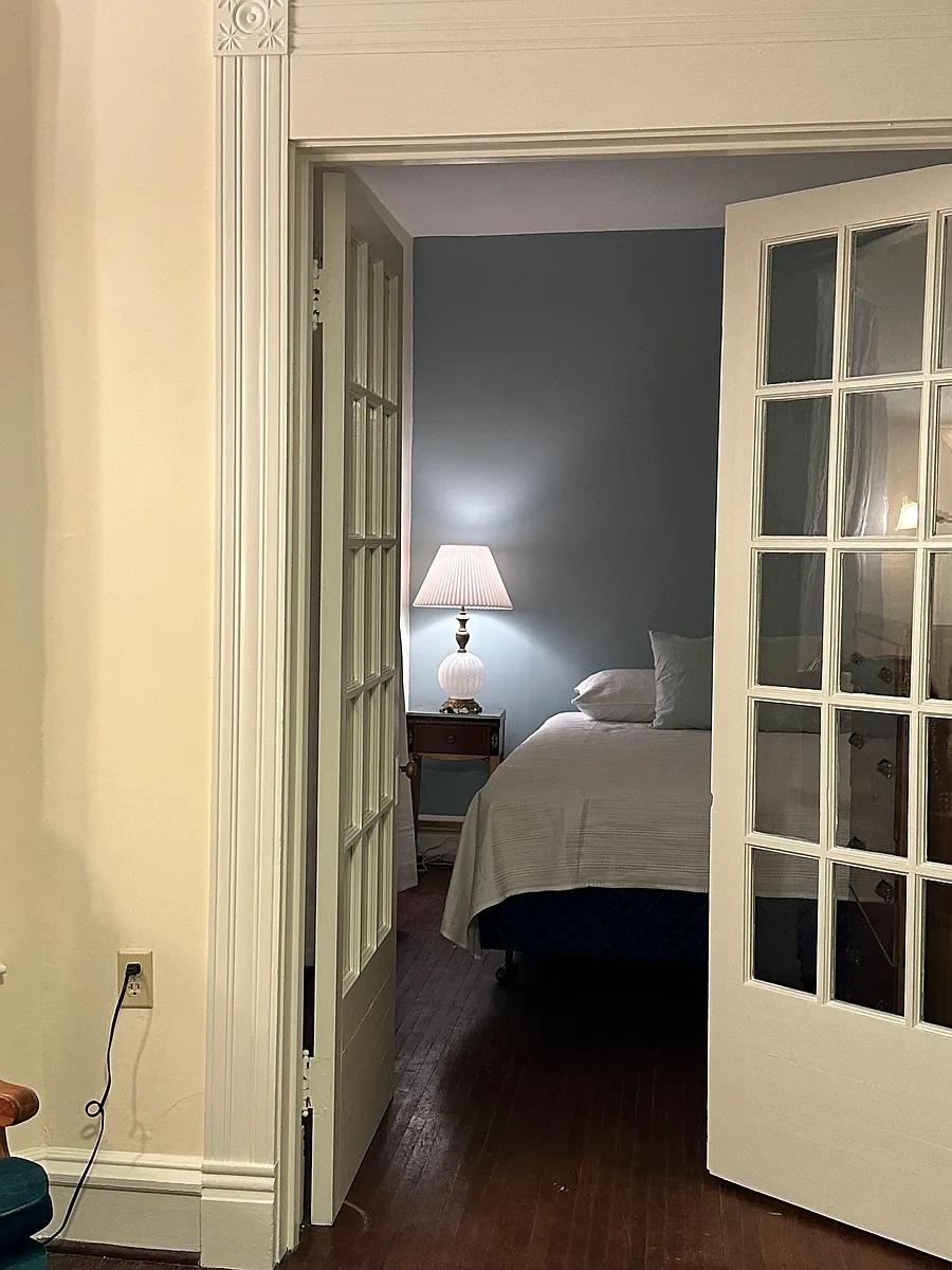 French doors lead into the bedroom. All linens, including sheets and towels are supplied. Curtains are blackout. - 603 E Armstrong Ave #1