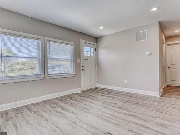 Other side of entry and living room