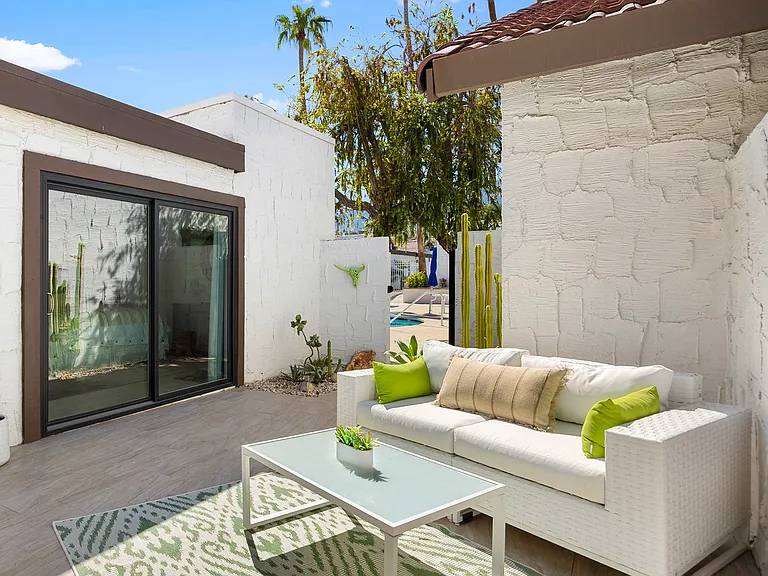 Front private patio with direct access to pool and spa.