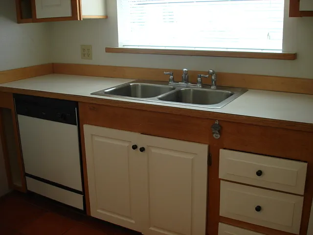 Garden Window, Sink, Storage Cabinets and Dishwasher to the bottom left.