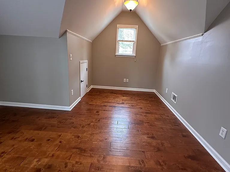 Extra Large Bedroom Over The Garage with sitting area including cubby storage closet picture here.