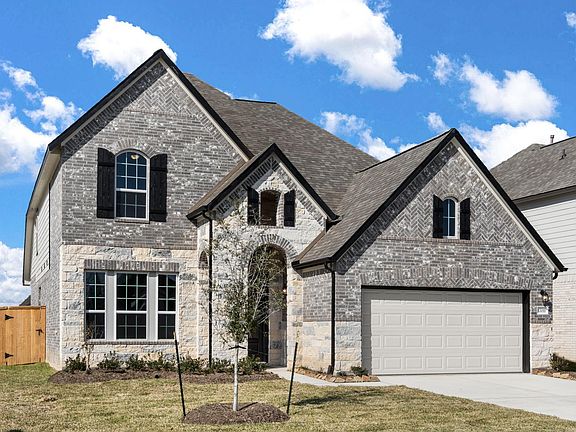 Welcome home to 17011 Daylilly Dune Way located in the Dellrose community and zoned to Waller ISD.