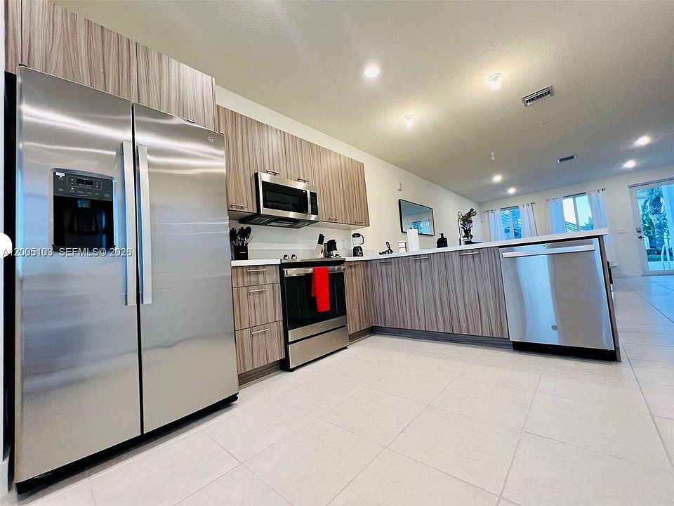 1st image of 10300 NW 66th St #101