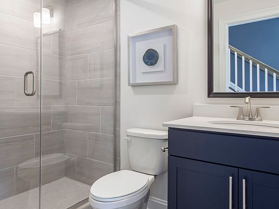 First Floor Full Bathroom with tiled shower