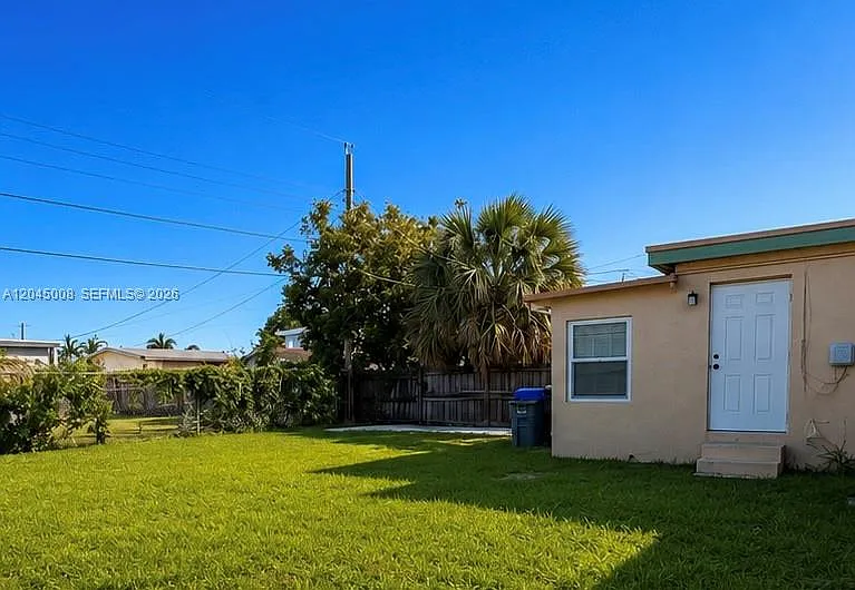 7720 Raleigh St — Photo 15