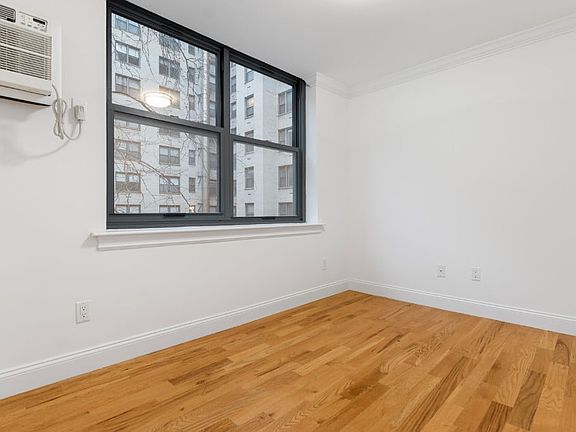 3rd image of 210 E 22nd St APT 2L