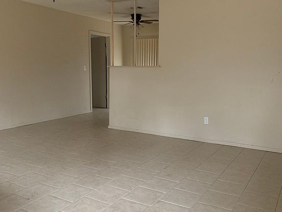 Living room - Dining in back next to Laundry
