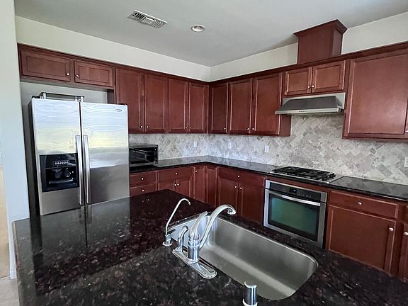 Granite countertop island in kitchen