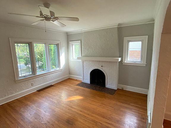 living room with wood-burning fireplace