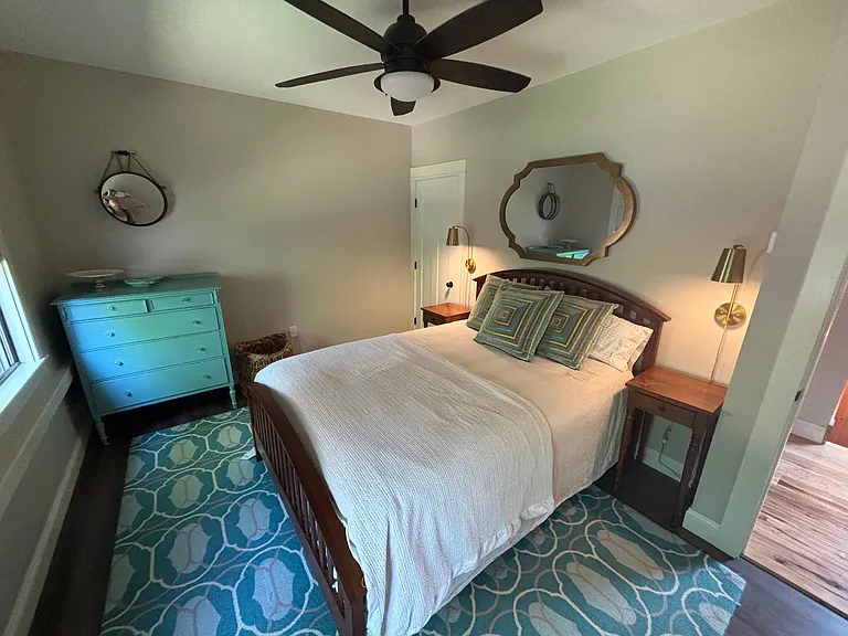 Queen Bed and walk in closet, overlooking the water