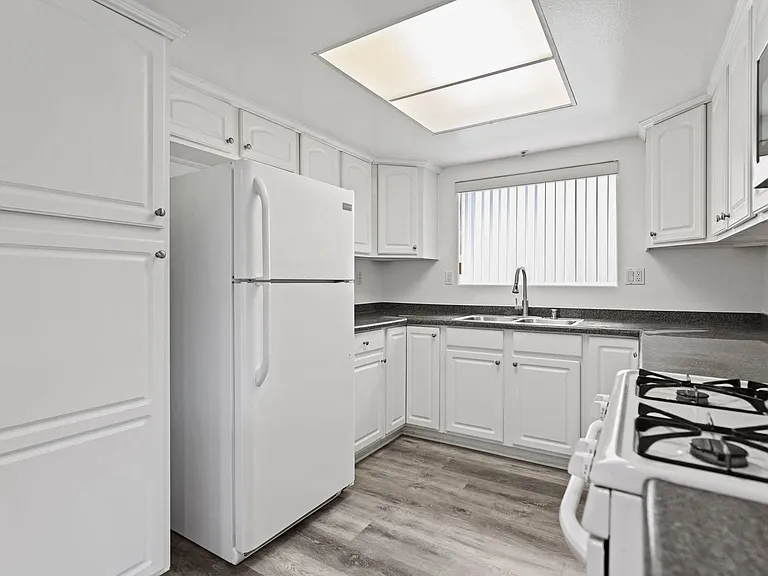 Kitchen with Appliances and Ample Cabinet Storage