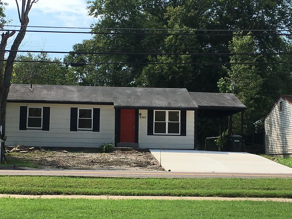 Front of home with new concrete driveway