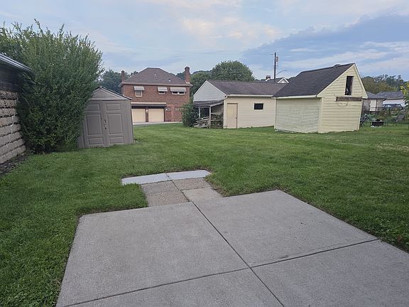 Spacious yard with storage shed