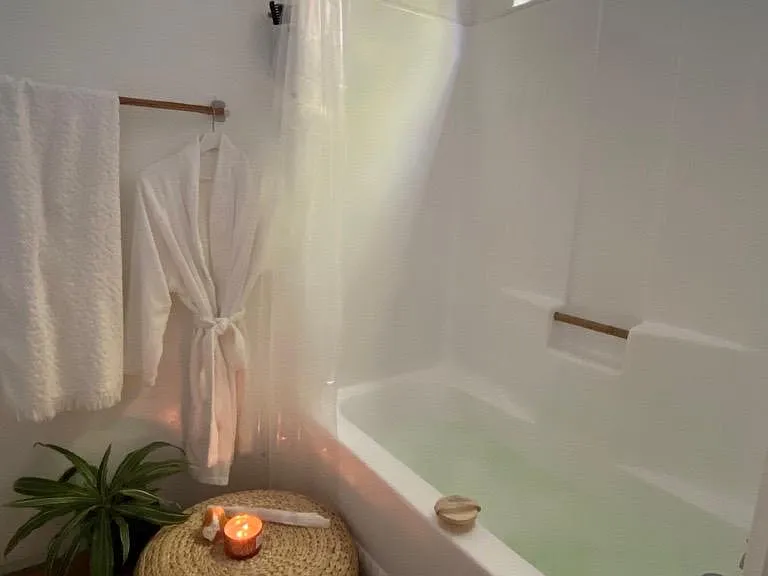 Downstairs full bathroom. Bath and shower was recently replaced.