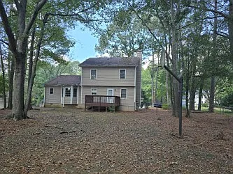 Dwelling-Rear/Deck/Basketball goal/paved