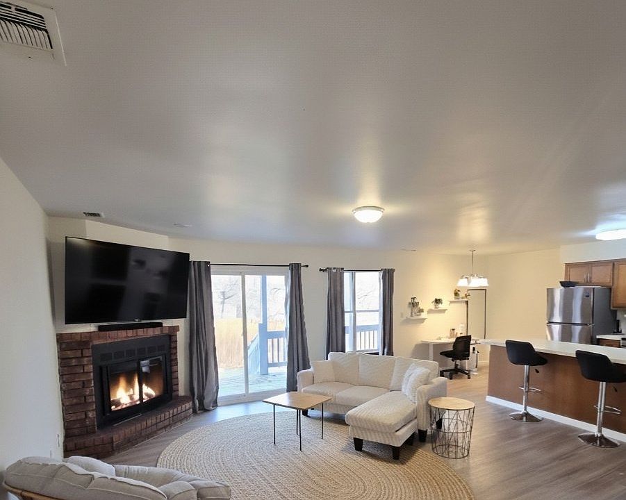 Living room with Downstairs Patio Access