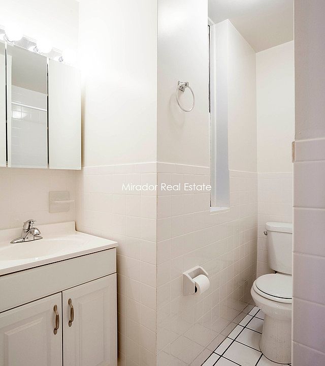 2nd image of 112 E 11th St APT 1A