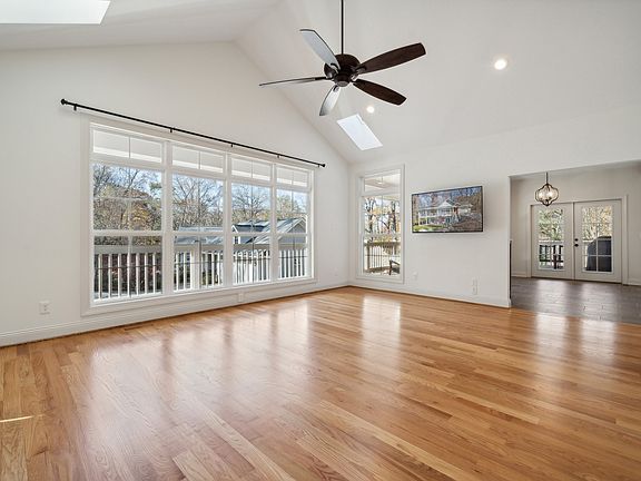 Bright, open living area with large picture windows.