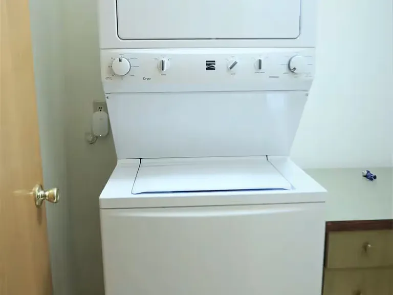 Second floor laundry room with washer and dryer