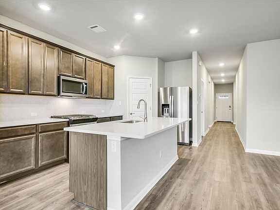 Spend some time cooking in this beautiful kitchen.