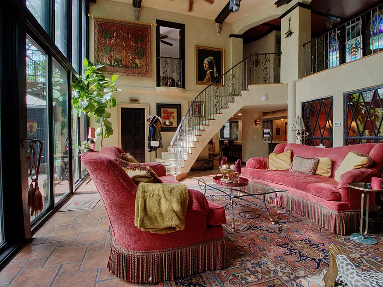 Spacious living room was once the art gallery decades ago. Art still abounds throughout the house