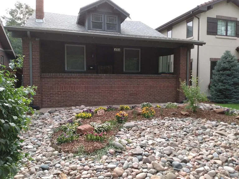 Front of the house with landscaping.