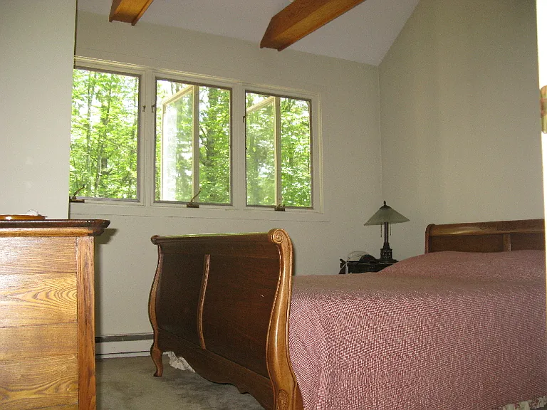 Master bedroom upstairs with queen size bed