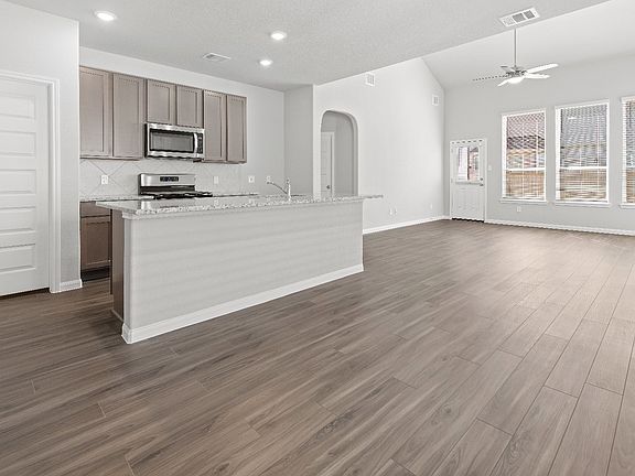 Dining Area to Kitchen and Family Room