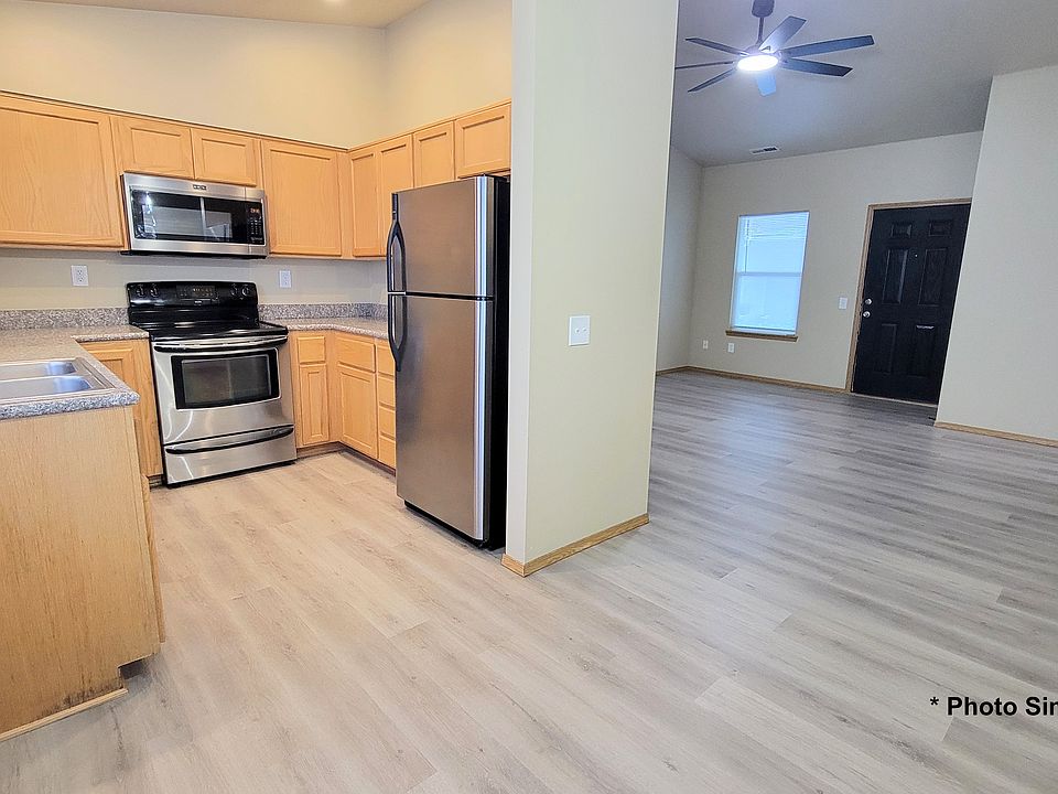 Kitchen, dining & living room (view from dining area)