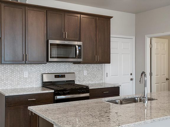 The open-concept kitchen spills into the dining room allowing for an open feel.