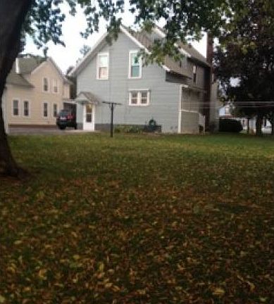 large back yard now partially fenced in