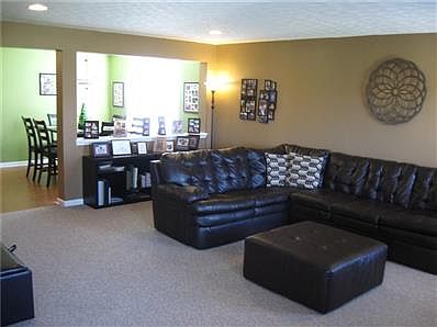 Great room with view of dining room behind.
