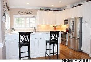 Kitchen with stainless appliance and an abundance of natural light!