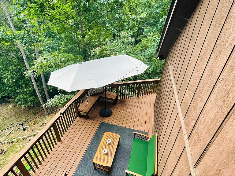 large wrap around deck overlooking lake