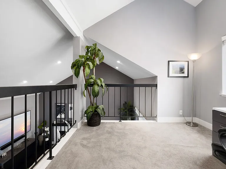 View when you step out of the upstairs bedroom. Home office loft with beautiful outdoor views and open concept feel as opens up to large vaulted living room.