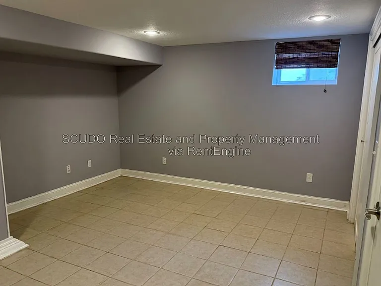 418 E 63rd Ter — Photo 15