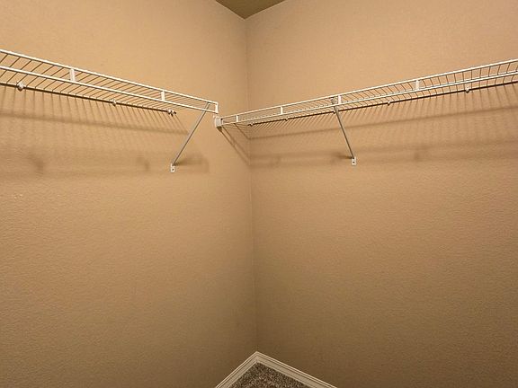Walk-in closet shelves.