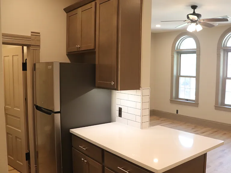 117 W Grand River Ave #202 — Photo 7