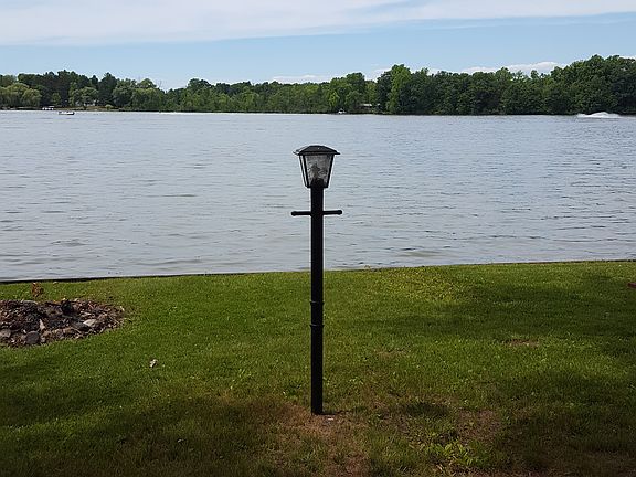 View of lake and light post