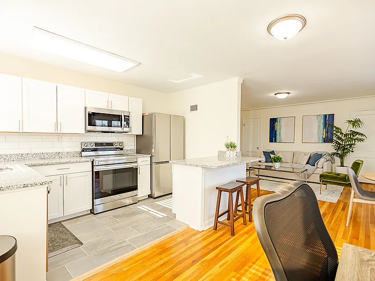 tiled kitchen with stainless appliances