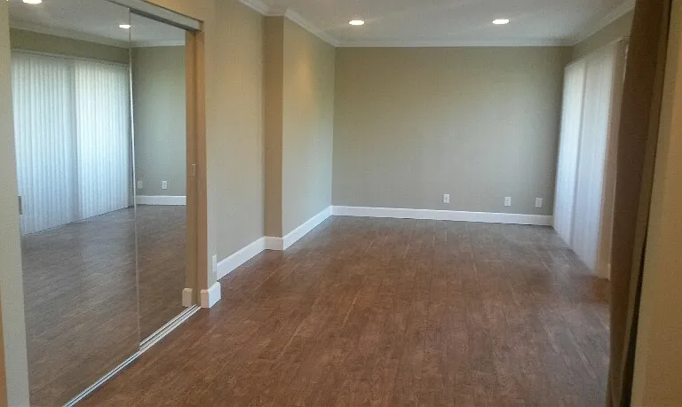 Spacious upgraded living room at the Azure a 1br/1ba corner apartment with a den and 4 balconies.