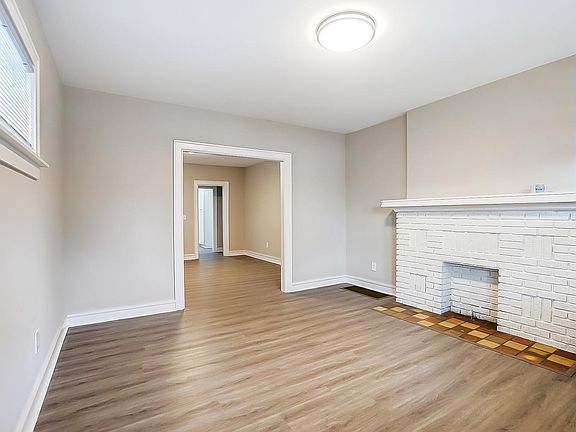 Living Room into Dining Room and Kitchen